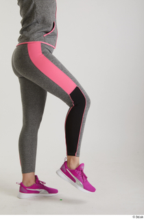 Mia Brown  1 dressed flexing grey leggings leg pink…